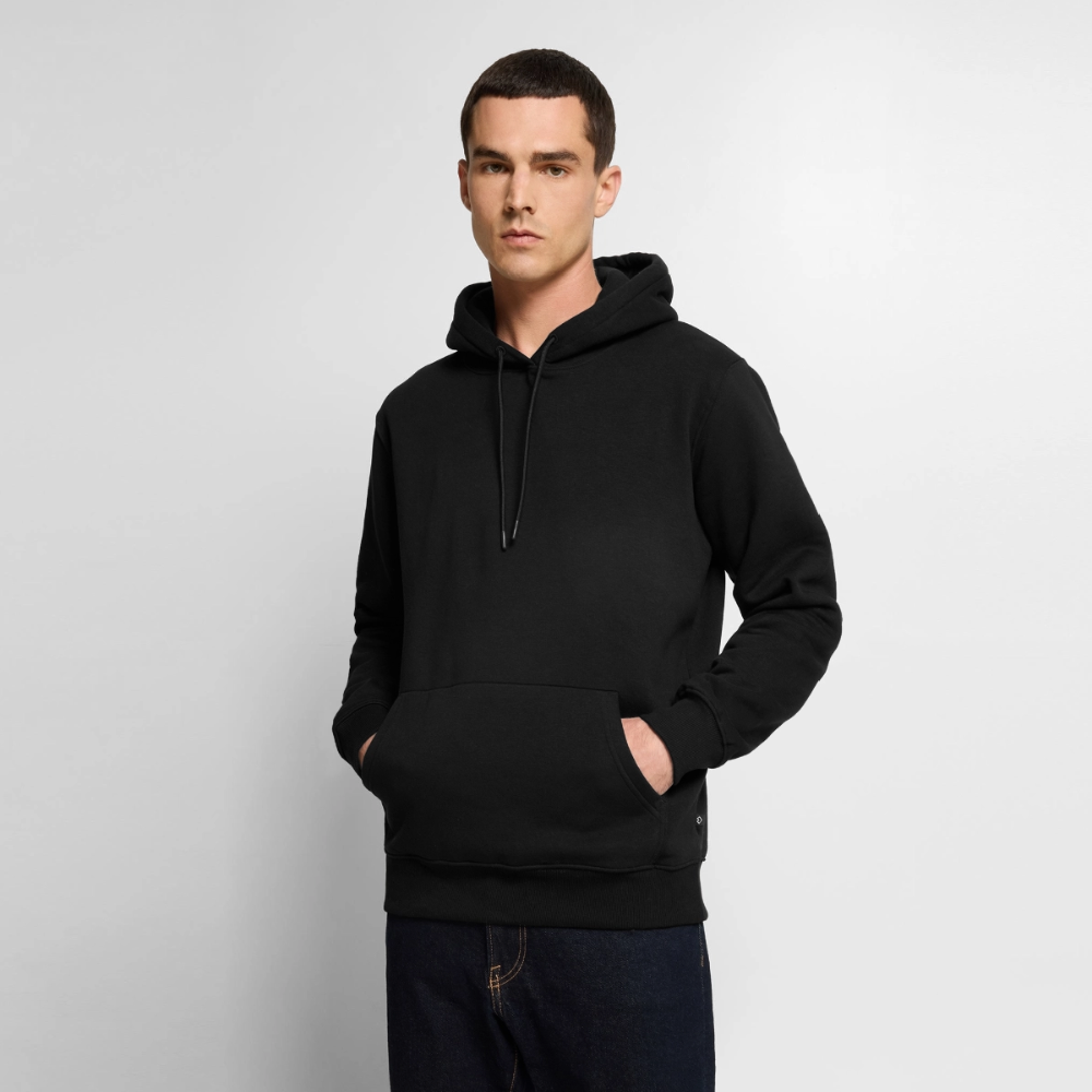 Männer Premium Regenbogen Einhorn Comic Hoodie – Statement Streetwear Unicorn zerstampft Helm – Bunter Oversize Hoodie - Schwarz